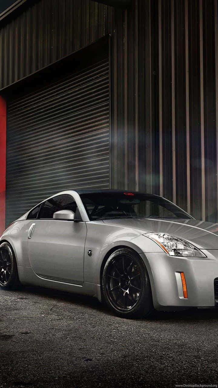 720x1280 Download Enjoy the thrill of driving the Nissan 350Z with your iPhone. Wallpaper, Phone