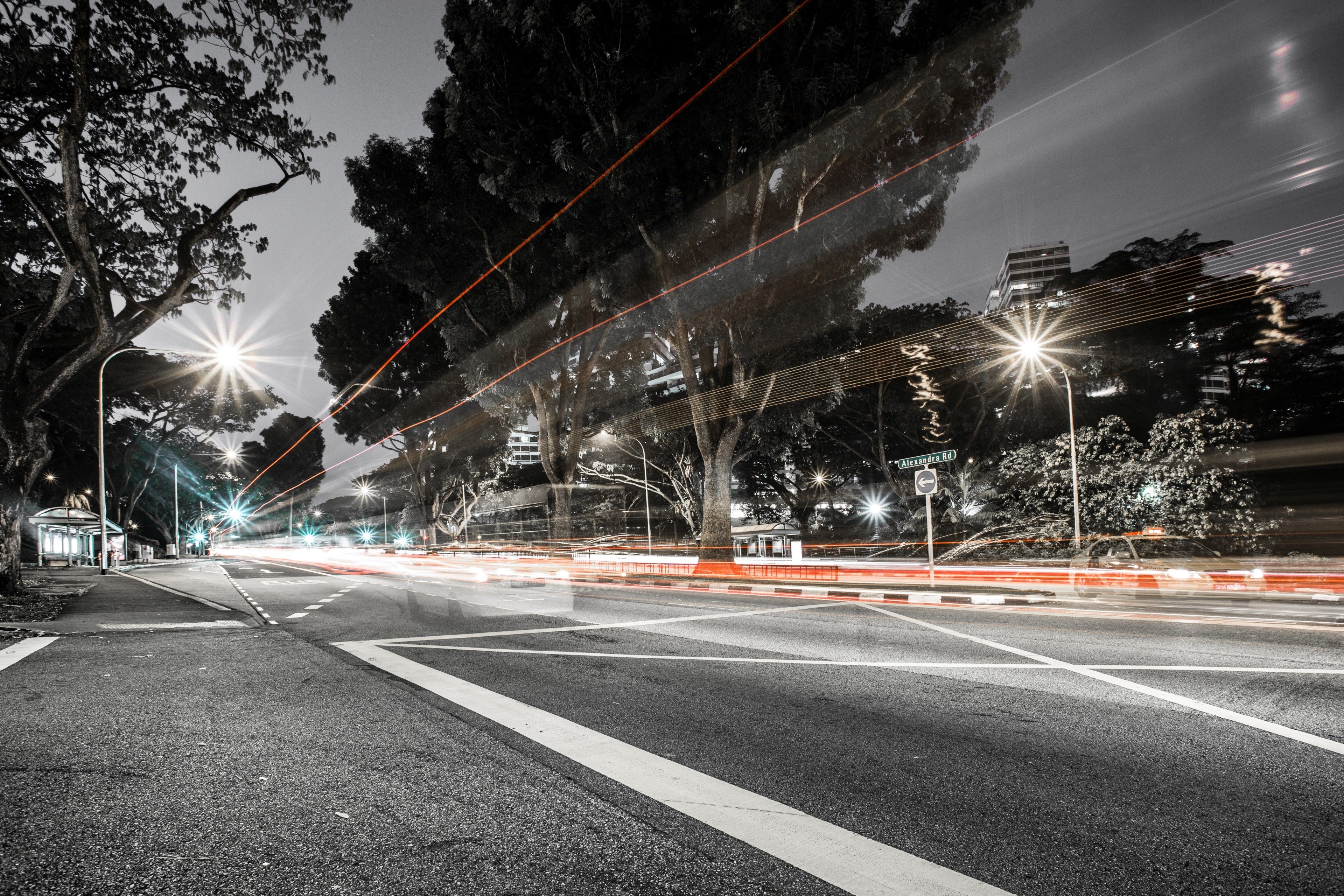 3840x2560 Wallpaper / a desaturated long exposure shot of an empty road with light trails, light trails on an empty road 4k wallpaper, Desktop