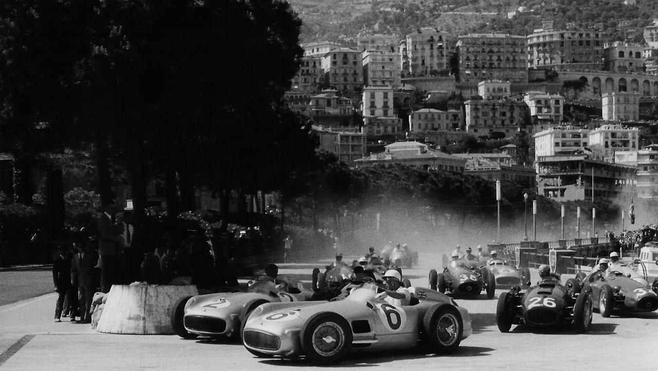 1280x730 autocar: Stirling Moss and Fangio in the 1955 Monaco Grand Prix, Desktop