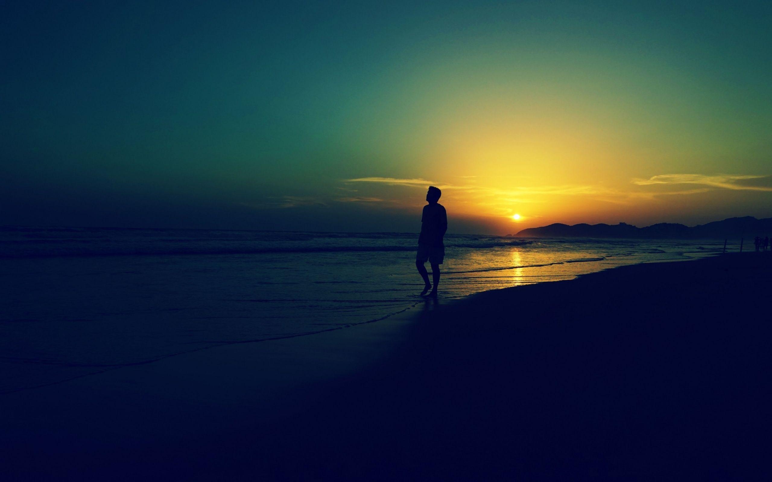 2560x1600 Sad Alone Man At Sunset Beach Waves Wallpaper, Desktop